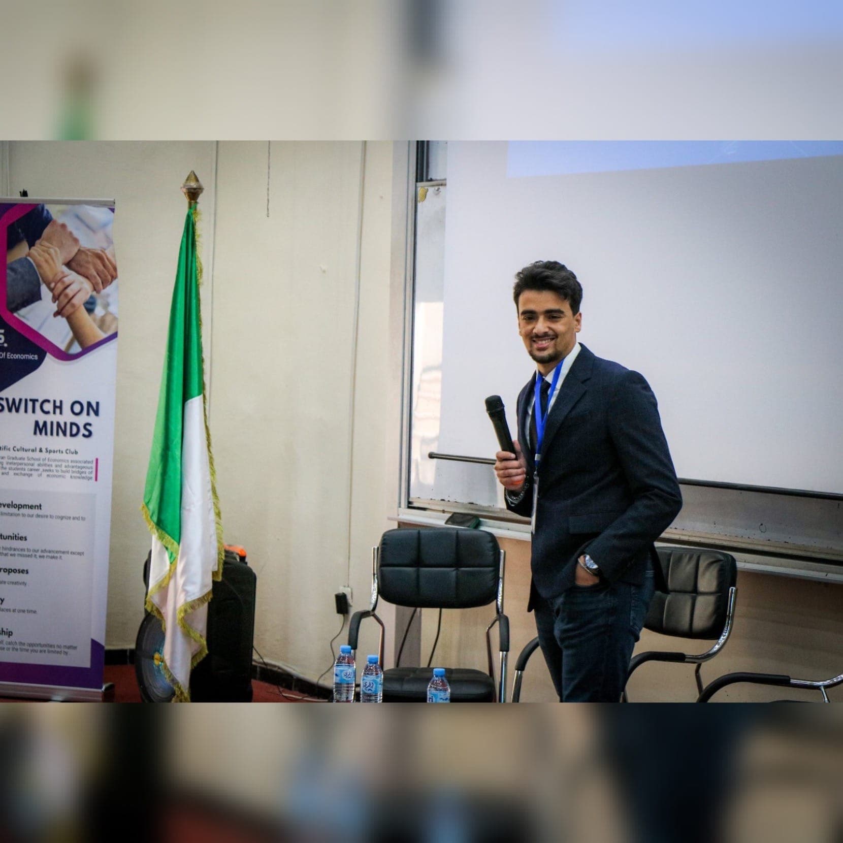 Lotfi Bendiaf speaking during an academic presentation.